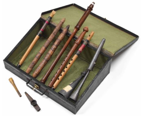 Bagpipe chanter, wooden recorder, lead organ pipes and various ethnic and other whistles, within a hard case 