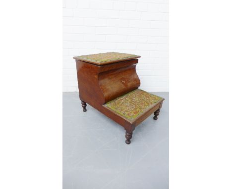 A Victorian mahogany bed step commode having a moulded top enclosing commode raised on turned supports, 46 x 53cm