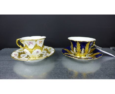 Two Meissen gilt embossed porcelain cabinet cups and saucers, with blue crossed swords marks (4)