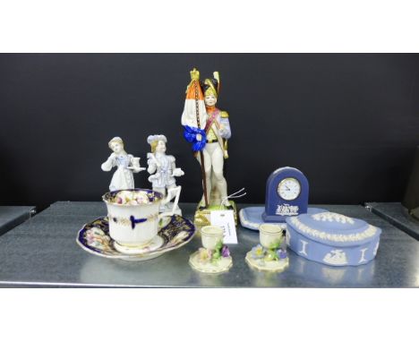 A mixed lot to include a Capo di Monte porcelain figure, Wedgwood Jasperware clock and trinket dishes, pair of Continental po