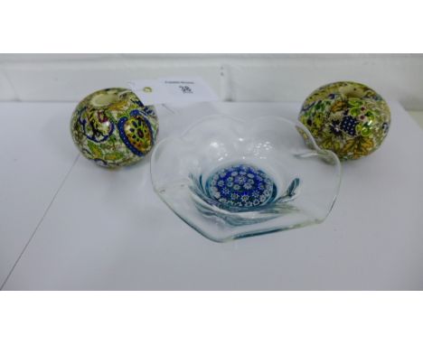 Pair of Grimwades chintz patterned ceramic bell pulls together with a John Deacon Scottish millefiori glass dish, (3)