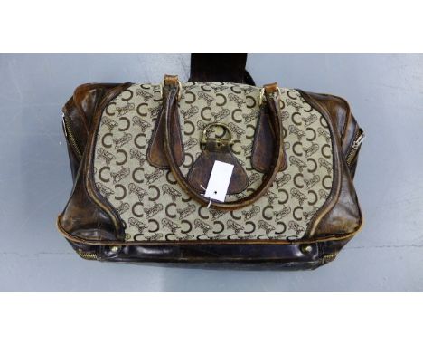 Vintage Celine luggage to include to two holdall with soft sides and brown leather edging, with gilt metal locks, largest 60 