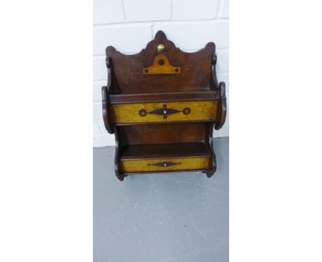 A 19th century mahogany wall shelf having shaped top over two short drawers, 29 x 45cm