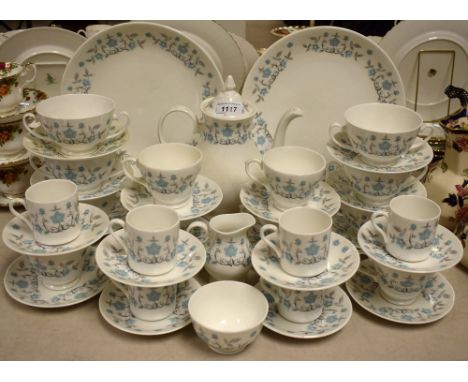 Ceramics - a part dinner service, Mayfair China, decorated pale blue flowers on white ground; six tea cups and saucers; six c