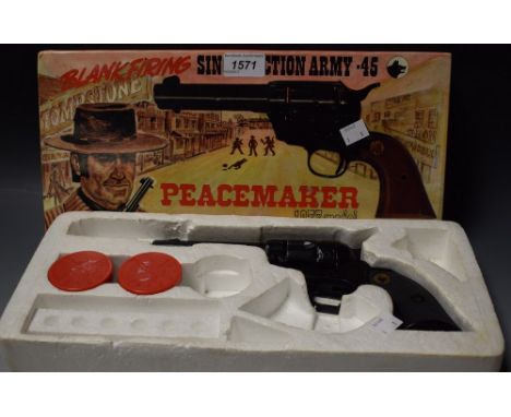 A Blankfiring Single Action Army .45 Peacemaker 1873 model gun, 1970s, in original fitted box, with accessories 