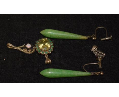 A pair of jade droplet earrings, screw fastening; a citrine and emerald pendent in white metal; a sterling silver diamond chi