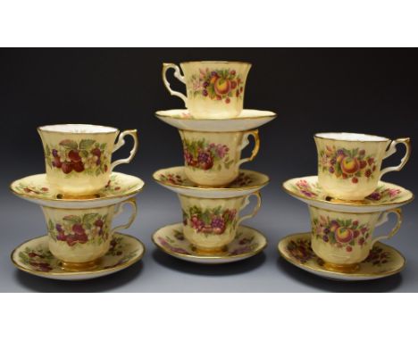 A Staffordshire 'Elizabethan' tea service for seven, printed with fruits and flowers
