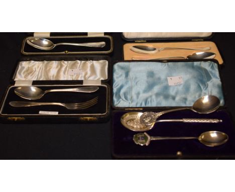 A pair of Walker & Hall silver spoons, Sheffield 1970, cased; another, single silver spoon, Birmingham 1929, cased; others in