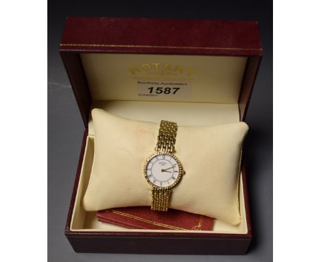 A lady's Rotary dress watch, diamante bezel, boxed with certificate