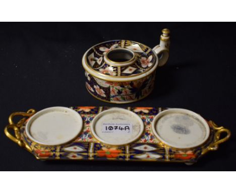 A Derby cylindrical inkwell, decorated in Imari palette ring loop handle, 10.5cm diam, crown, crossed batons and D mark in re