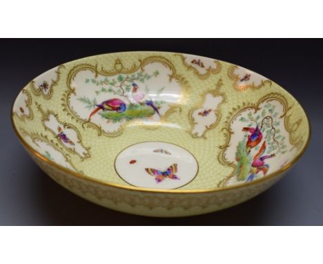 A Royal Worcester ogee shaped bowl, painted by John Freeman, signed,  with alternating vase and fan shaped reserves with fanc