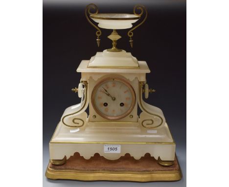 A 19th century French alabaster mantel clock, plinth base
