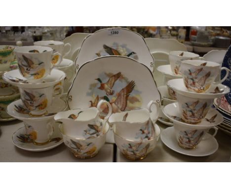 A 20th century porcelain six setting tea service, printed with mallards; another, similar, Canadian geese