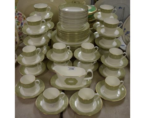 A Royal Doulton Sonnet pattern dinner service for twelve comprising plates, side plates, bread and butter plates, tea cups an