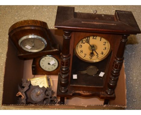A mahogany wall clock; a Mercury mantal clock; a cuckoo clock; a shield shaped wall barometer, etc (5)