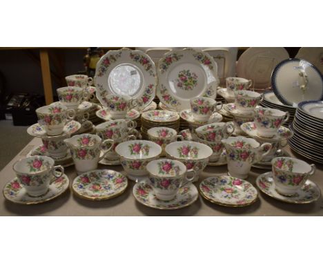 A comprehensive Royal Stafford Rochester pattern tea service comprising cups and saucers, side plates, salad plates, sandwich