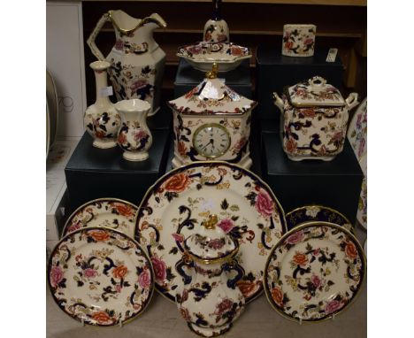 A Mason's Mandalay pattern tea caddy and cover, mantel clock, two-handled vase and cover, water jug, bell, dinner plates; etc