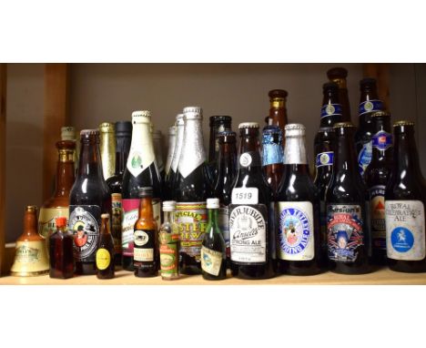 A Bells whisky decanter; others; Ind Coope bottled ales; other brewery memorabilia; a miniature Guinness bottle with contents