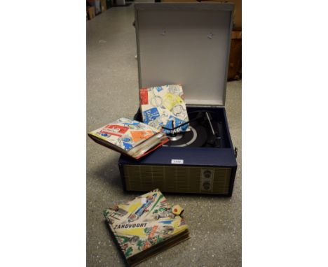 A 1960's portable record player, Solid State; vinyl singles including The Rolling Stones, Roy Orbison, Joe Cocker, etc contai