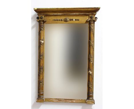 19TH CENTURY GILT OVERMANTEL MIRROR, the bevelled plate flanked by twisting vine columns, height 76cm