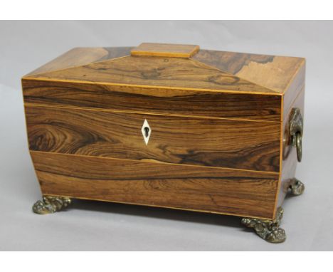 GEORGE IV ROSEWOOD TEA CADDY, of sarcophagus form, the fitted interior with twin lidded canisters and cut glass mixing bowl, 