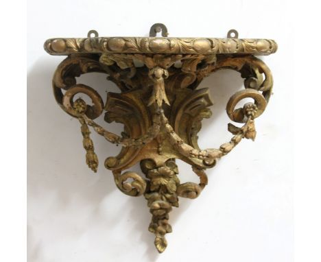 GILTWOOD WALL BRACKET, with scrolling foliate decoration, height 30cm