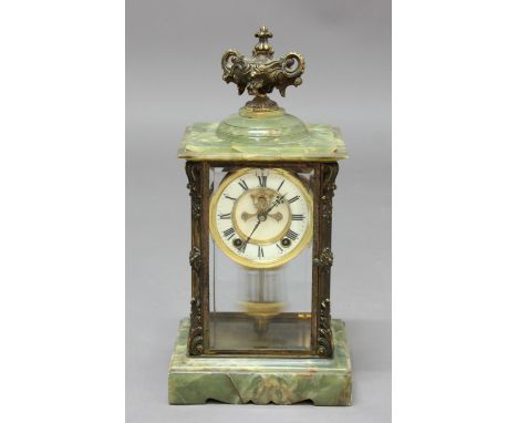 BRASS AND GREEN ONYX FOUR GLASS MANTEL CLOCK, the 3 3/4" ivorine dial with a visible Brocot type escapement on a striking mov