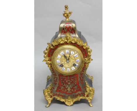 FRENCH LOUIS XV STYLE MANTEL CLOCK, the 3 1/2" brass dial with enamelled Roman numerals on a brass, eight day movement striki