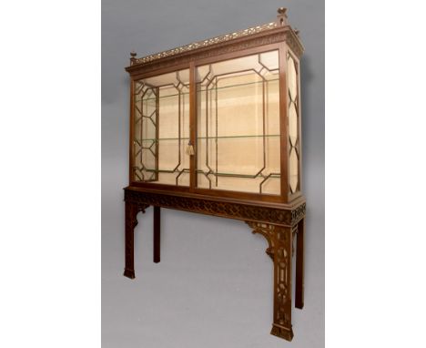 CHINESE CHIPPENDALE STYLE MAHOGANY DISPLAY CABINET, the greek key fretwork gallery above a pair of astragal glazed doors, the