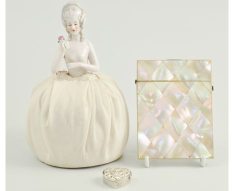 Mother of pearl card case, and paper knife, a folding dessert knife, a crinoline doll pin cushion, a silver pill box and othe