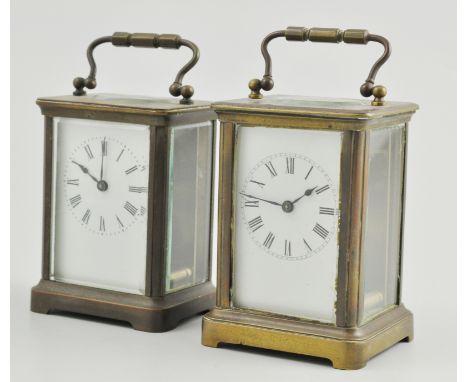 French brass carriage clock, white enamel dial and a similar carriage clock, (2).