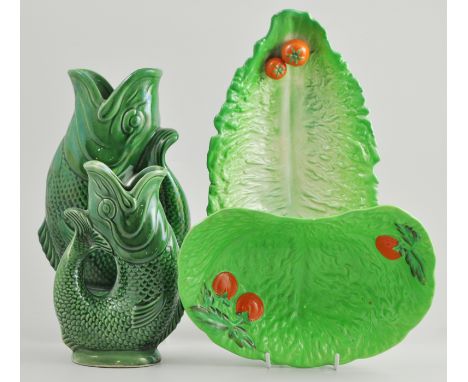 Two Carltonware salad leaf dishes, two Dartmouth and Devon fish jugs, (4).