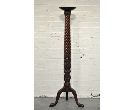 19th Century mahogany torchere,  twist column with stick leaf base, over a pineapple terminal, triform supports, height 131cm