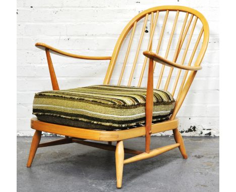 Ercol pale beech easy chair, with open arms.