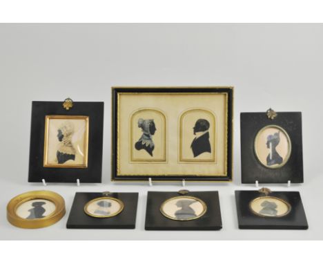 Two Victorian portrait miniature profile silhouettes, head and shoulders of lady and gentleman, highlighted with watercolour,