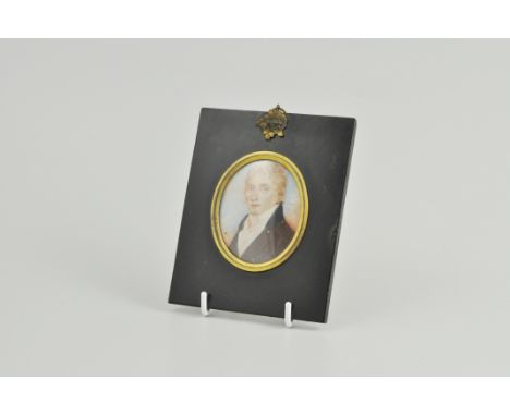 English School, 19th Century, head and shoulders portrait of a man, on ivory, 6cm x 4.5cm, unsigned, rectangular ebonised fra