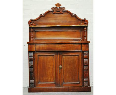 Victorian mahogany chiffonier, shaped back with open shelf, serpentine front, frieze drawer, two cupboards, all on a box plin