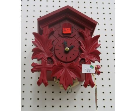 * German red cased small cuckoo clock with weight driven movement 