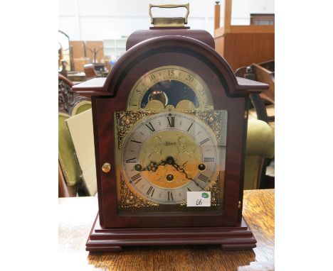 * Hermle German mahogany finished cased bracket type clock; spring wound; quarter hour chime RRP £430