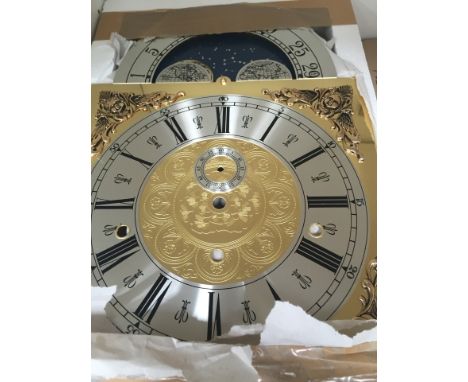 * Five brass longcase dials with moon roller facility and silvered chapter ring. 40 cm x 28 cm