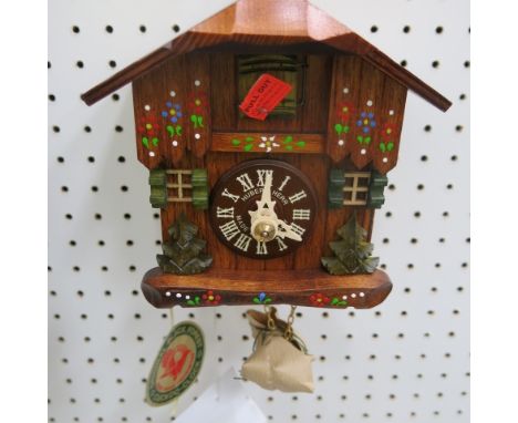 * German small wooden cased cuckoo clock with weight driven movement  RRP £204