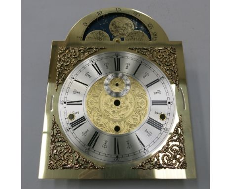 * Four German brass longcase clock dials with silver chapter rings & moon roller facility (stock no D2021) 33 cm x 25 cm over