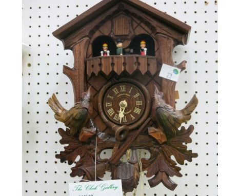 * Hubert Herr wooden cased cuckoo clock with mechanical weight driven movement RRP £445