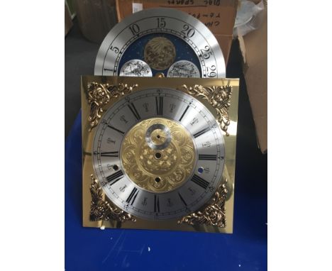 * Five brass longcase dials with moon roller facility and silvered chapter ring. 40 cm x 28 cm