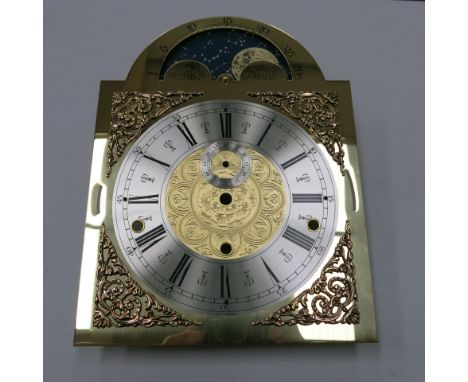 * Four German brass longcase clock dials with silver chapter rings & moon roller facility (stock no D2021) 33 cm x 25 cm over