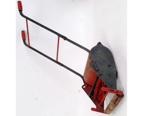 WEBB CHILDS LAWNMOWER: A charming vintage tinplate and metal childs Webb manual lawnmower. In green and red, all original, st