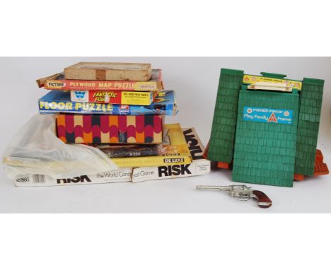 BOARD GAMES & TOYS: An assorted mix of vintage board games and toys to include Risk, John Bull Printing Outfits, Fisher Price