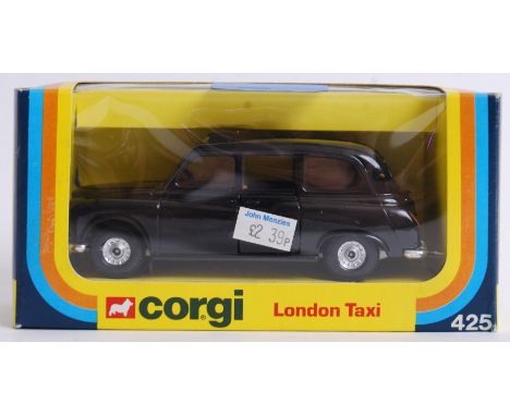 CORGI: An original vintage Corgi 425 London Taxi boxed diecast model. Mint, in original box.