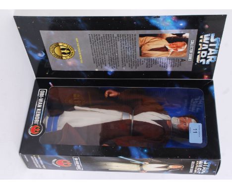 STAR WARS: an original Kenner made Star Wars 12" action figure of Obi Wan Kenobi. c1996.. Within the original box, appears un