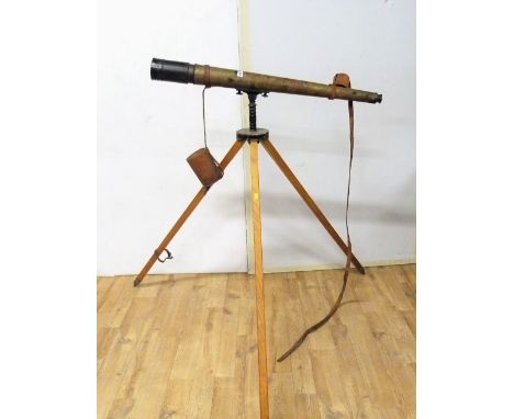 Military telescope by W. Ottway & Co., 1939, brass & black metal on tripod stand, 115cm long. Condition report:Lens - Black m